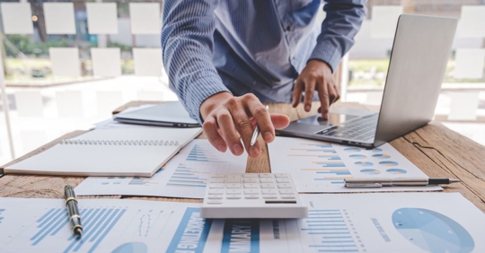 Man busy checking the status of his finances