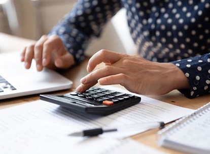 a person using a calculator